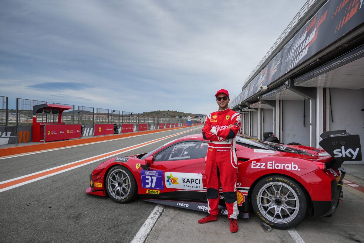 Mohamed Hamdy beside his Ferrari before the Valencia race